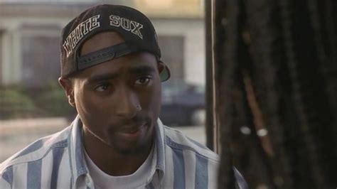 tupac wearing sox cap